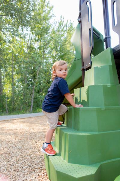 Kid playing on playground