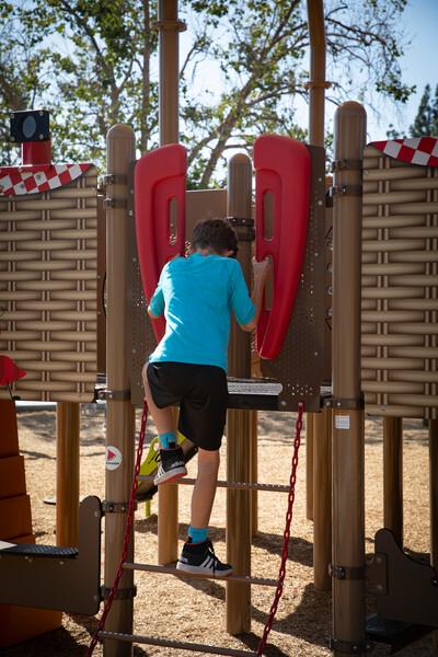 Chain ladder coated in red Tendertuff for temperature-resistant protective coating features red VIbe handholds.