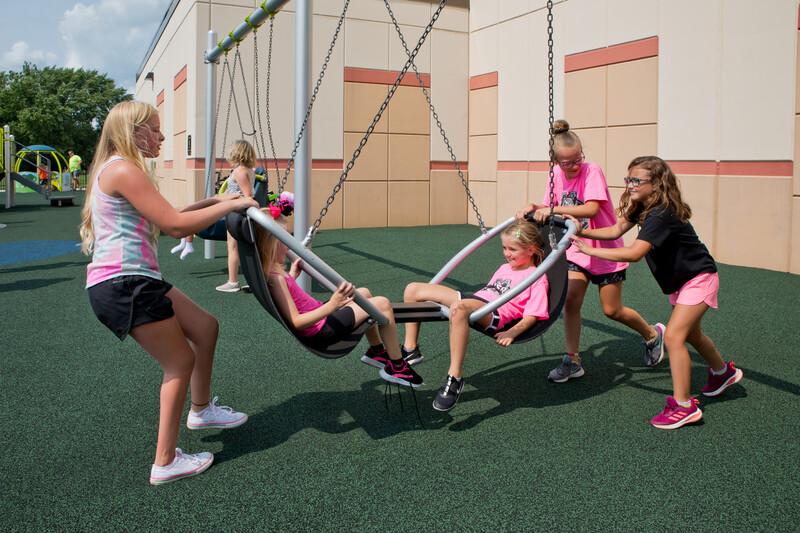 Grils playing on We-Go-Round® with DigiFuse® Panels