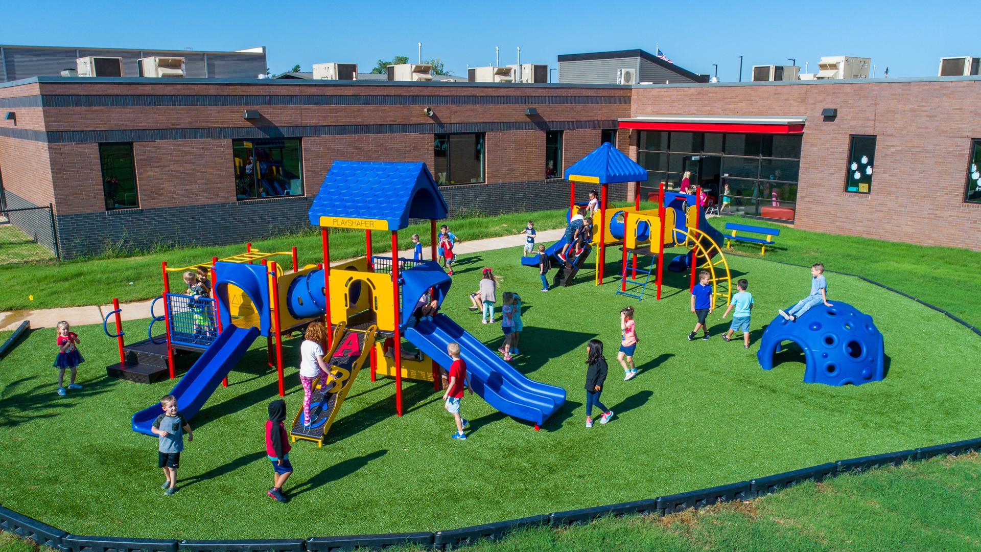 Riverwood Elementary School kids paying on  a sunny afternoon.