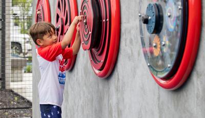 Boy plays with wheel