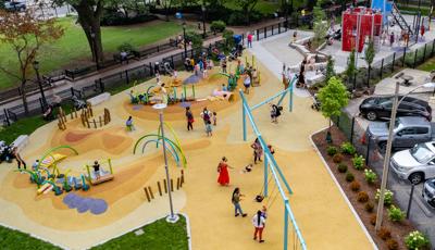Aerial of families playing at Seneca Park, Eli M. Schulman Playground