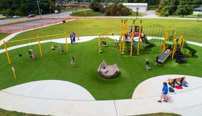 Garrison Park in Crossville, TN features a 7-post Netplex® playstructure and net climbers, overhead events, bridges to challenge balance, and multiple slides including the roller slide for ages 5 to 12. It also has an OmniSpin® spinner and playground swings. As well as an Aquatix™ spray park.