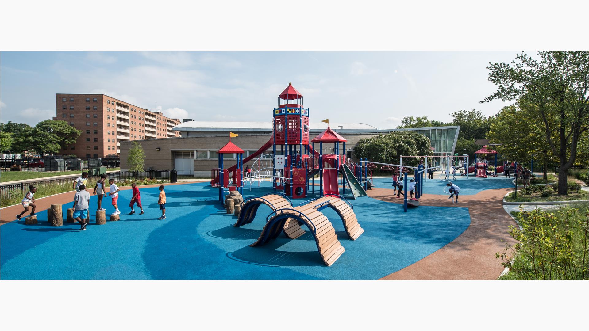 King Greenleaf Playground in Washington, DC features a lighthouse-themed PlayBooster® play structure and wave-themed climbers for all ages.