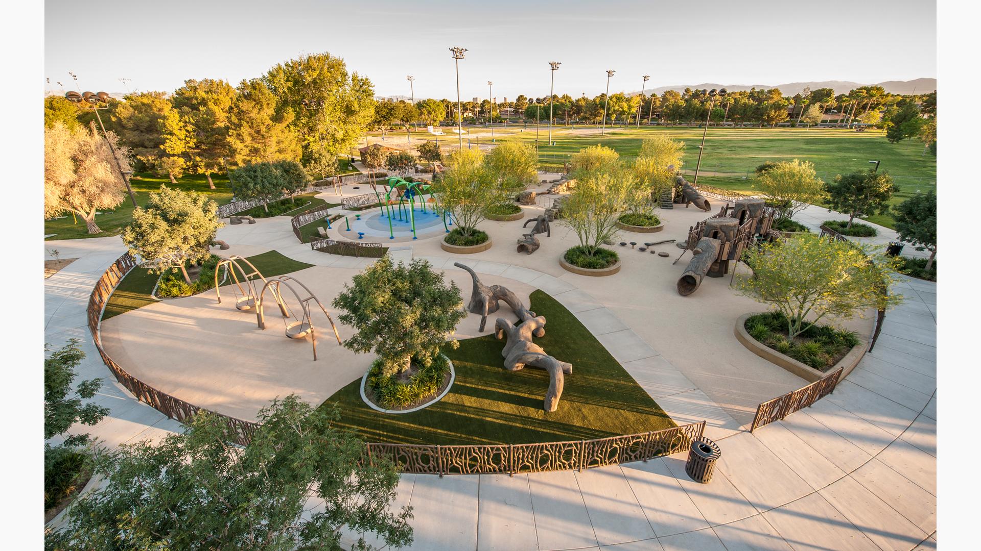 Large, sprawling nature-inspired park.  Includes a Log Crawl Tunnel, Log Tunnel Slide, Mushroom Steppers, Log Balance Beam and a Log Stacker. Unique and customized tree stumps scatter around the play area, and logs are made out of our durable, long-lasting Glass Fiber Reinforced Concrete.