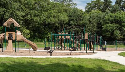 PlayBooster and Playshaper play systems at Shadow Woods Park. Freestanding Global Motin and other are present on the playground.