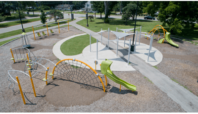 Douglass Park Lexington, KY. A linear-designed Evos® playstructure featuring  Swiggle Stix® bridge, RingTangle® Climber, an OmniSpin® spinner, SkyWays® 3-Point Tension Sails, and Hemisphere® Climber.