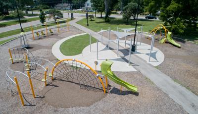 Douglass Park Lexington, KY. A linear-designed Evos® playstructure featuring  Swiggle Stix® bridge, RingTangle® Climber, an OmniSpin® spinner, SkyWays® 3-Point Tension Sails, and Hemisphere® Climber.