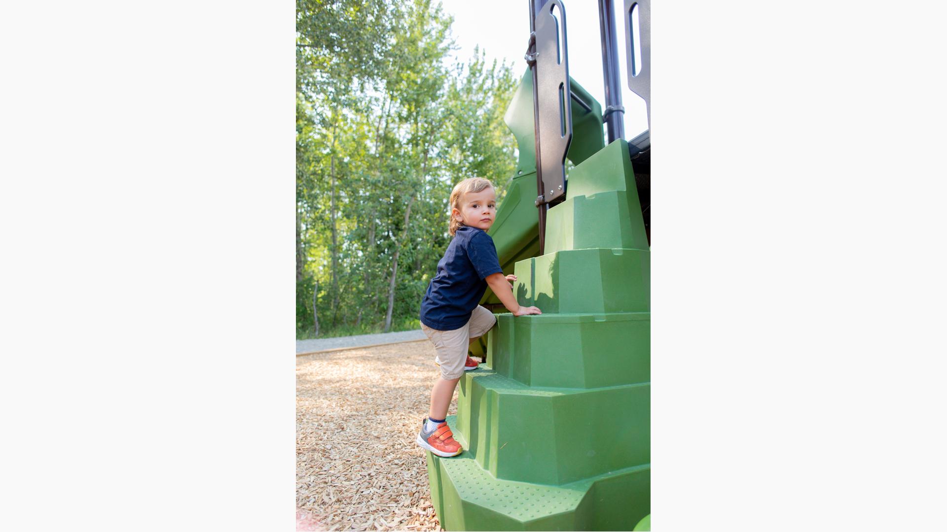 Kid playing on playground
