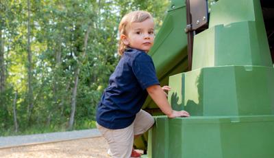 Kid playing on playground