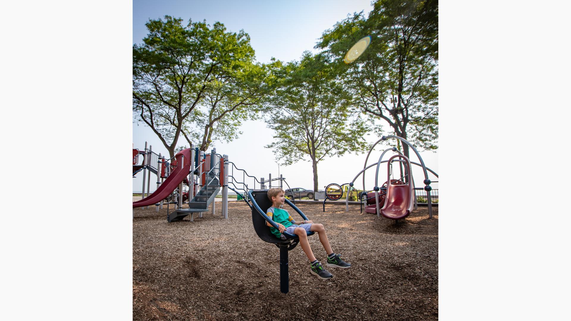 Boy sitting in chill spinner