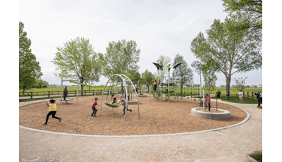 Legion Memorial Park, Winnipeg, MB includes a ZipKrooz®, a PlayBooster Netplex® play structure, climbers, slides and other unique play activities.