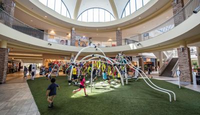 Lougheed Town Centre Burnaby, BC. An Evos® play system for ages 5 to 12 features the O-Zone® rings, Hemisphere Climber®, RingTangle™ climber, SwiggleStix™ bridge