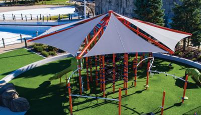 Netplex structure under custom shade sails next the Rolling Hills County Park splash pad