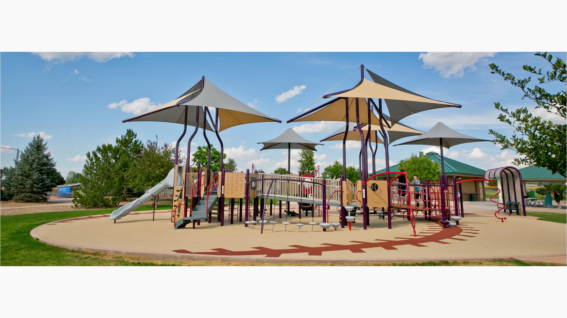 Northern Lights Playground Thornton, CO. Baseball themed playground at Northern Lights Ball Field Complex. featuring a PlayBooster® play structure includes ramps throughout the play structure. Plus, the Oodle® Swing and Global Motion®.