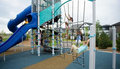 Boy hanging on Net climber