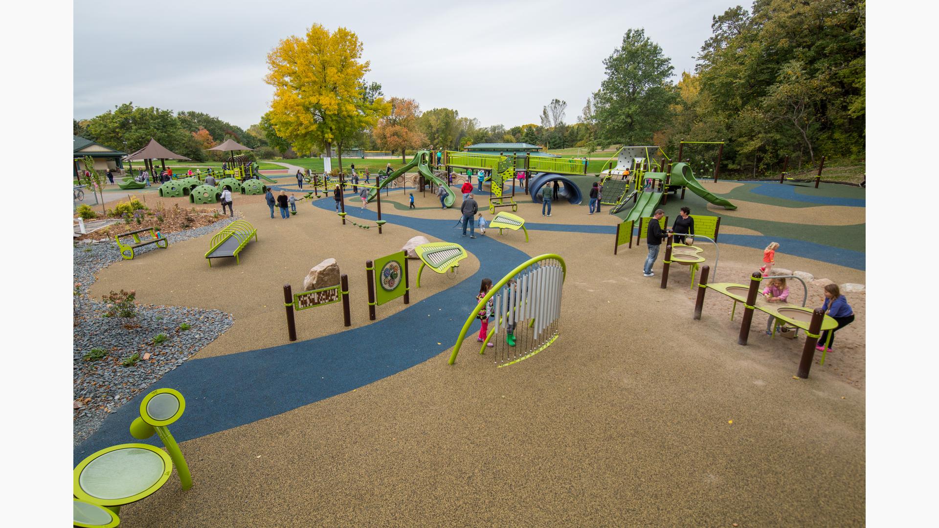 Families enjoy the many activities of Woodridge Park. Children of all abilities can enjoy all the amenities from tall PlayBooster slides and custom net climbers to Rhapsody® Musical Instruments to multiple Cozy Domes and much more.