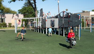 Children playing on custom F-6 at Colonia Park