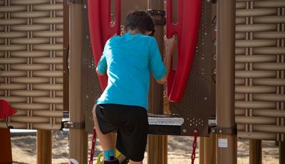 Chain ladder coated in red Tendertuff for temperature-resistant protective coating features red VIbe handholds.