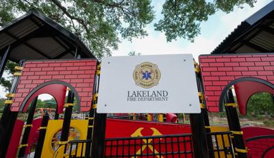 Detail of Lakeland Fire Department sign on play structure