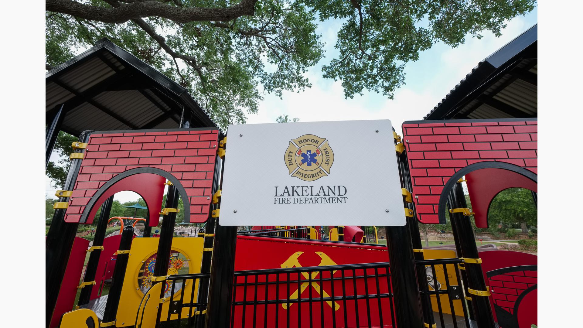 Detail of Lakeland Fire Department sign on play structure
