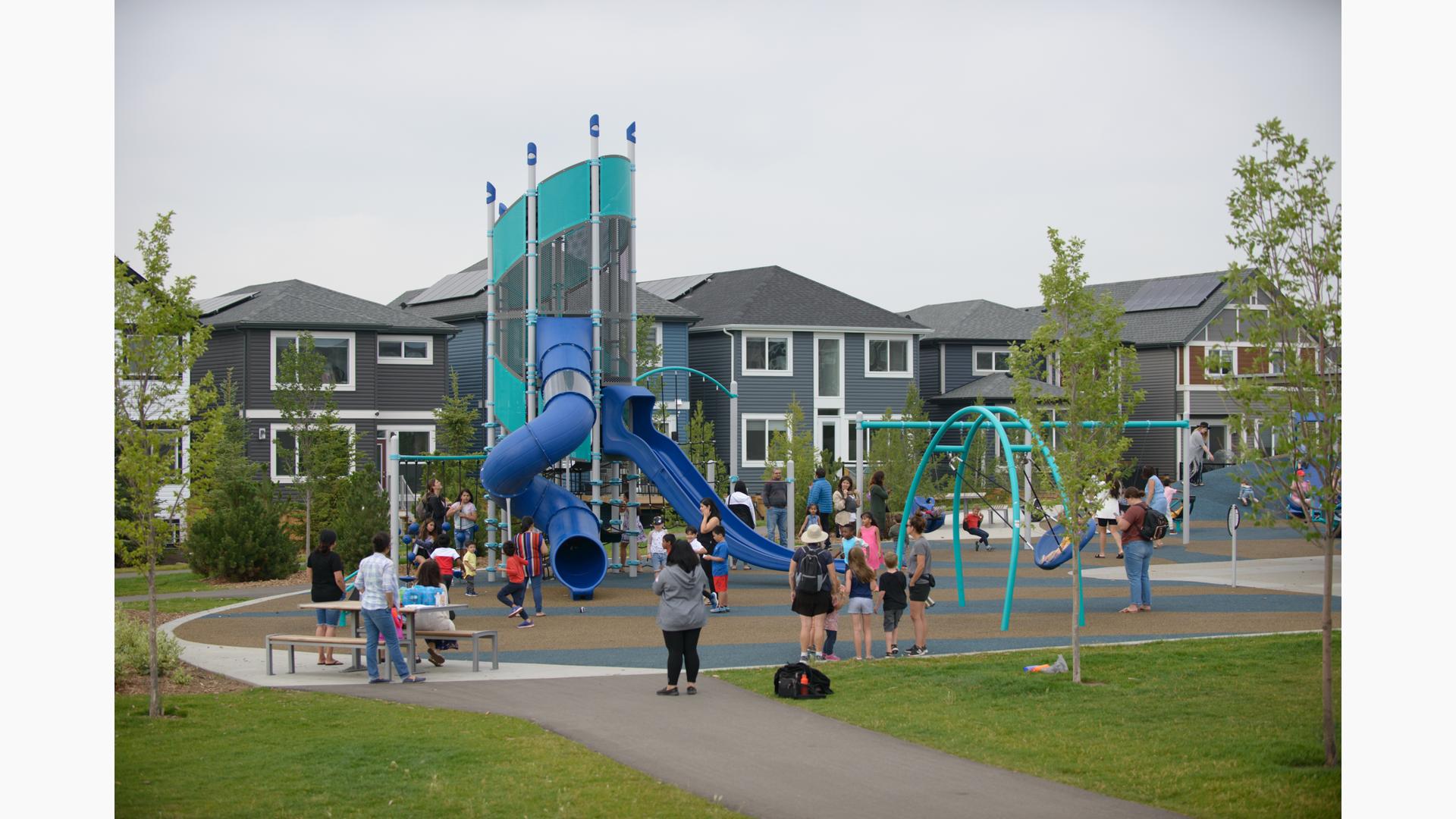 Seton Playground Calgory, AB Canada nicknamed Elsa’s Tower features the Super Netplex® and slide down the Double Swoosh Slide,  We-Saw®,  the Chill® Spinner and the Oodle® Swing. As well as a Smart Play Motion for kids ages 2 to 5.
