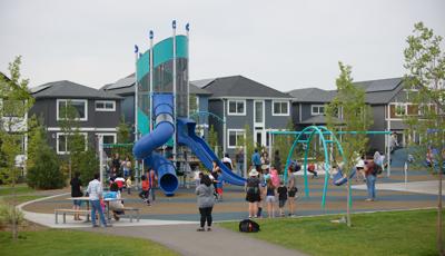 Seton Playground Calgory, AB Canada nicknamed Elsa’s Tower features the Super Netplex® and slide down the Double Swoosh Slide,  We-Saw®,  the Chill® Spinner and the Oodle® Swing. As well as a Smart Play Motion for kids ages 2 to 5.