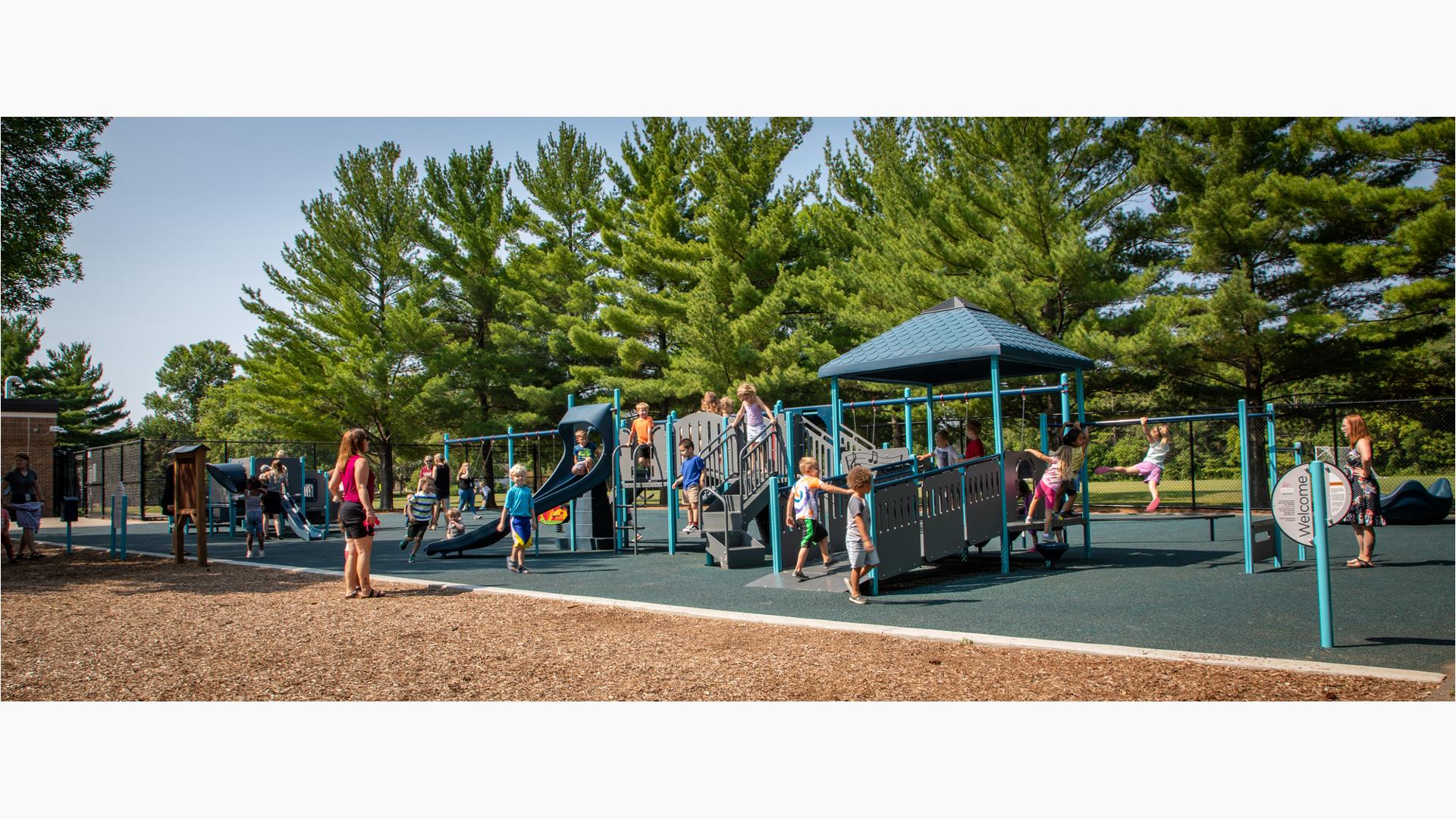 Children playing on PlayShaper® playstructure