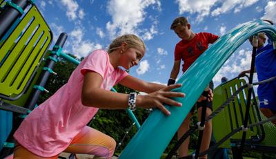 Detail of Permalene® Handholds of Flex Climber as children play