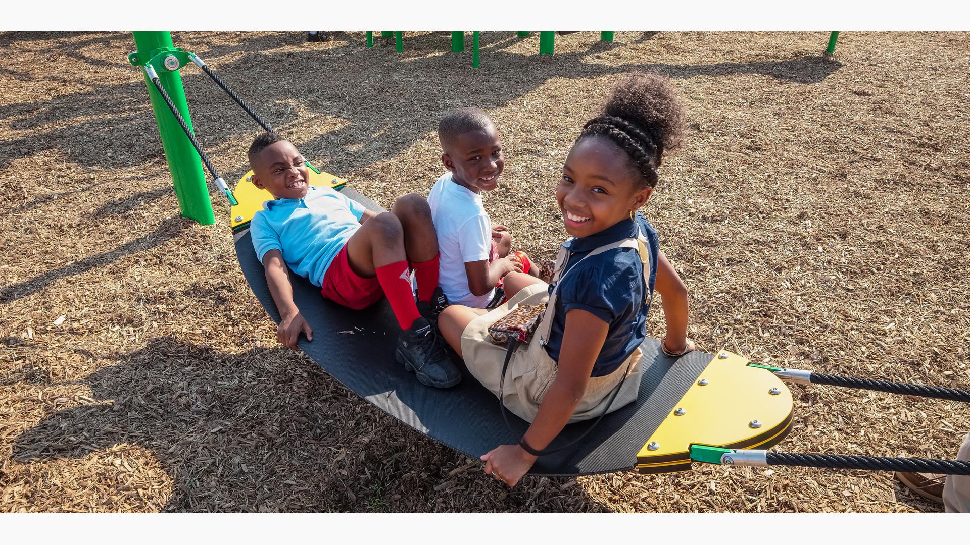 Children sitting on Boogie Board