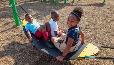 Children sitting on Boogie Board