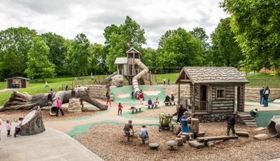 Lake Rebecca Park Reserve, Rockford, MN. A nature-inspired PlayBooster® with three unique levels features The giant split log, holes and other secret nooks and crannies.