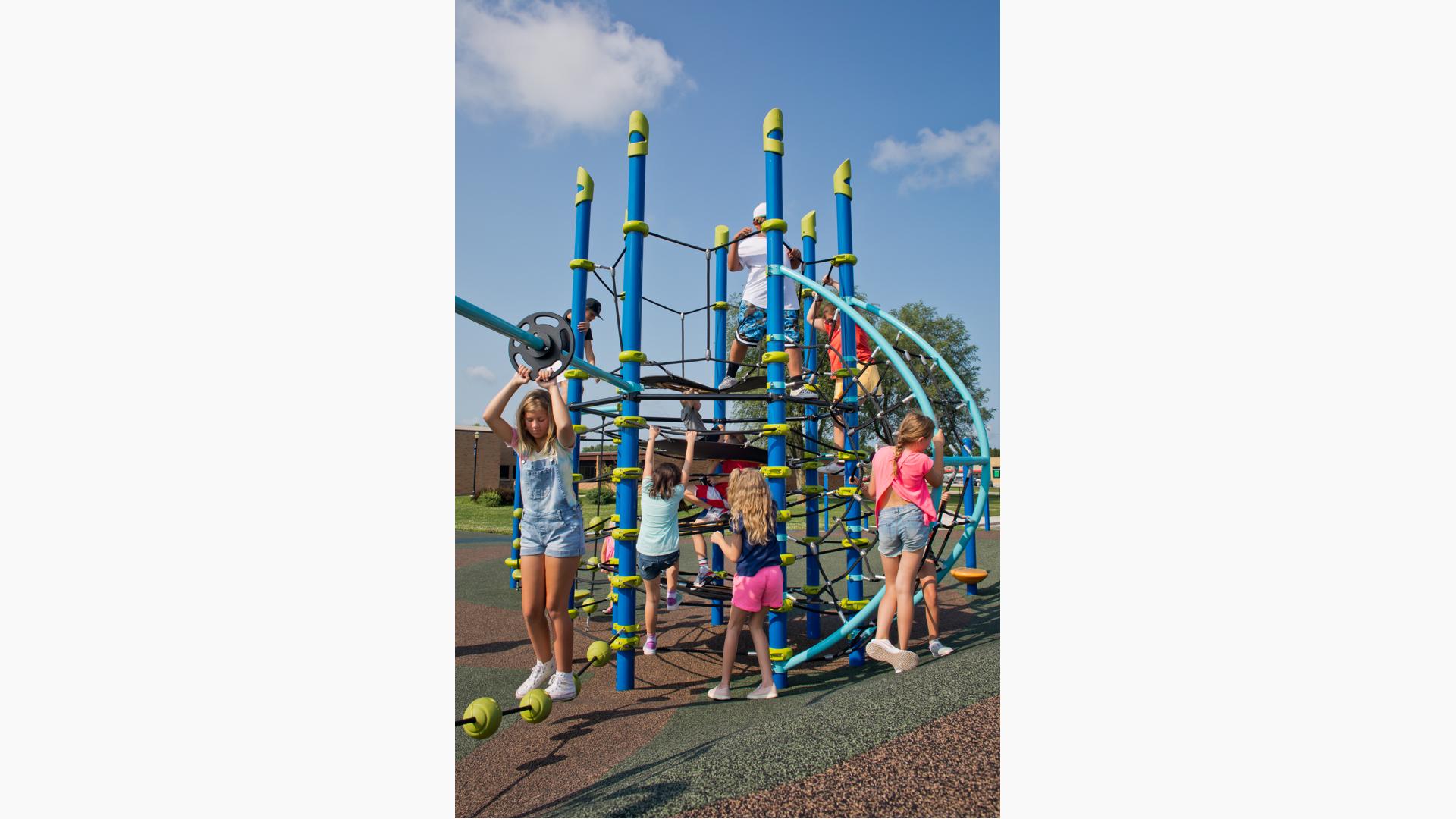 Kids using Netplex play structure