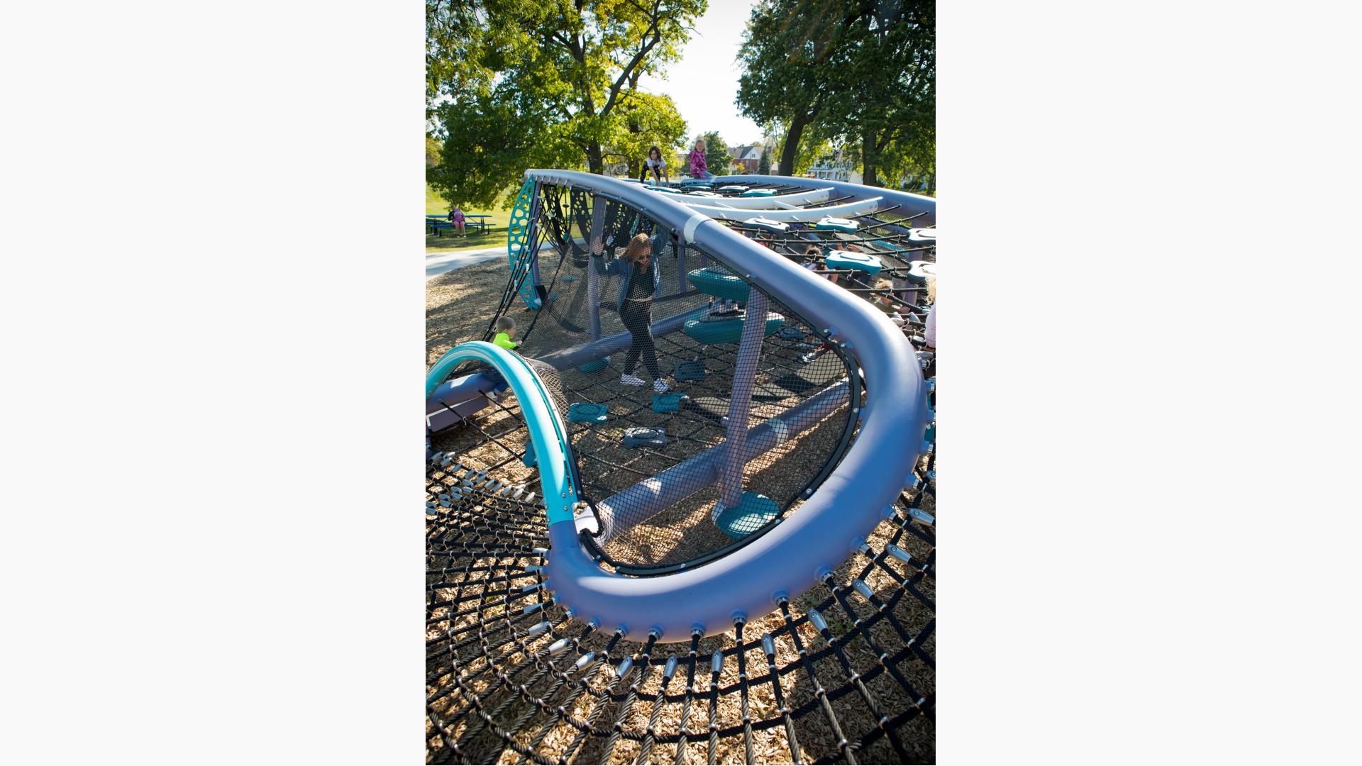 Children playing inside Quantis™ netplay concept playground