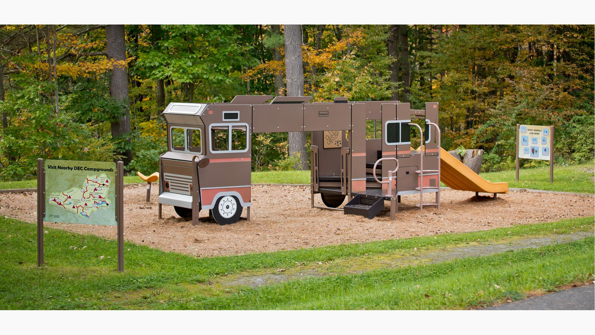 Custom playground designed to look like a an RV or motorhome parked at a campground