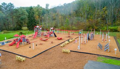Surrounded by forest, Highland Ave Park is one part extreme fitness and one part imaginative play system.