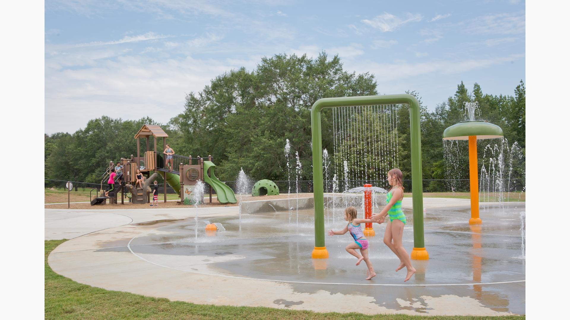 Nature Trail Splash Park and Playground Hamilton, AL. A PlayBooster® Tree House themed playground. Featuring the Discovery Tree Climb™, Log Steppers and DigiFuse® activity panels and much more. Along with a nearby Aquatix® splash pad.