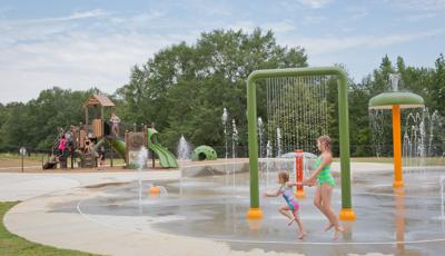 Nature Trail Splash Park and Playground Hamilton, AL. A PlayBooster® Tree House themed playground. Featuring the Discovery Tree Climb™, Log Steppers and DigiFuse® activity panels and much more. Along with a nearby Aquatix® splash pad.