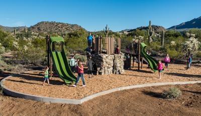 Mimicking the desert landscape around it, Desert Arroyo Park in Mesa, AZ features a natural play experience. Attached directly to the PlayBooster® playstructure, the Canyon Collection® kindles the spirit of adventure while encouraging continuous play that's both physical and imaginative.