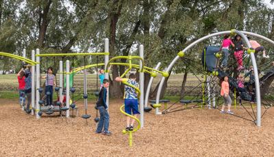 La Verendrye School Portage la Prairie, MB Canada. Playground features the Evos® Eclipse® Net Plus, arched posts, and star-shaped net climber. The Rush Slide extend the challenge and fun to more playground components. Bridges, climbers and playground spinners for ages 5-12.