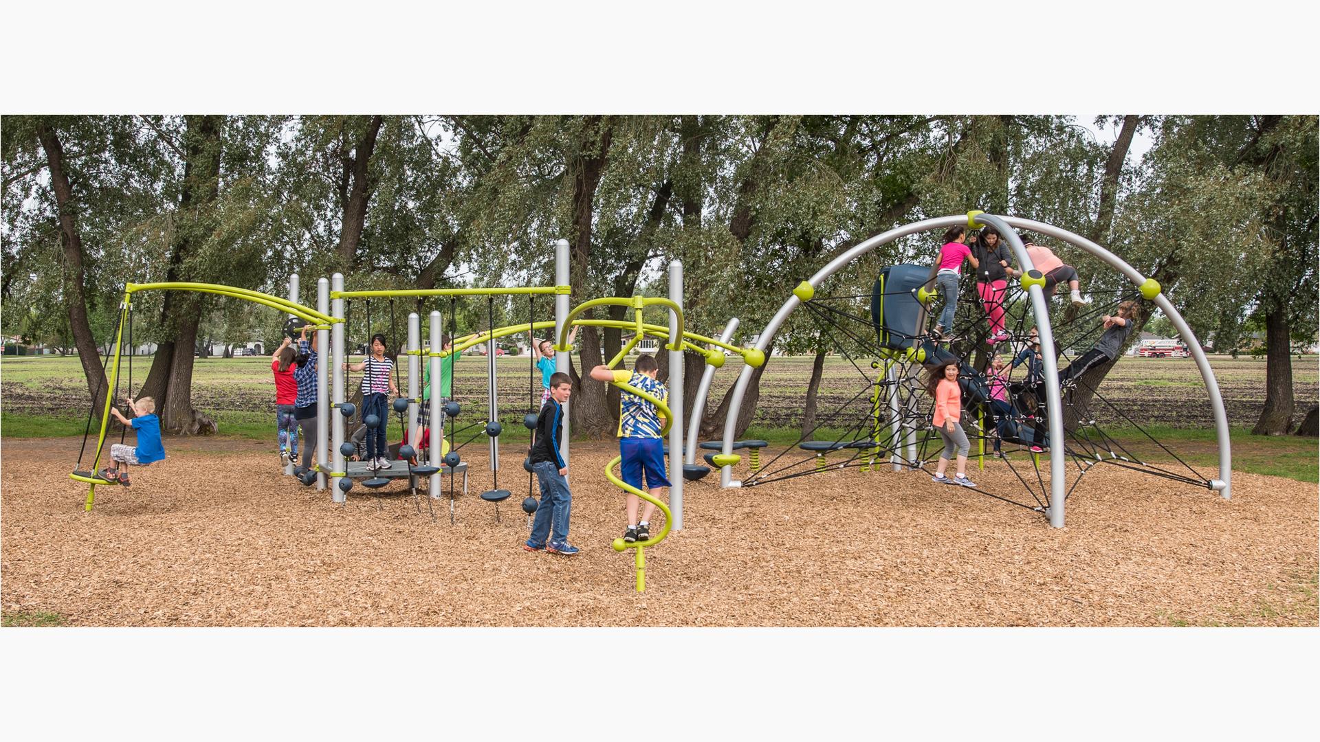 La Verendrye School Portage la Prairie, MB Canada. Playground features the Evos® Eclipse® Net Plus, arched posts, and star-shaped net climber. The Rush Slide extend the challenge and fun to more playground components. Bridges, climbers and playground spinners for ages 5-12.