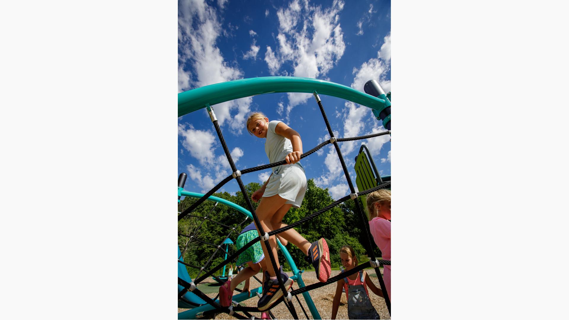 Kids playing onFlex Climber w/Permalene® Handholds