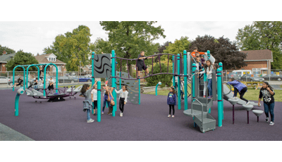 Komensky Elementary playground in Berwyn, IL, brought by KABOOM! features a Cascade Climber, a Canyon Climber, and a Double Swoosh Slide®. The PlayBooster® play structure also features freestanding play components like the We-Saw™, Saddle Spinners, Bobble Riders and swings. Best of all, the playground incorporates the school colors.