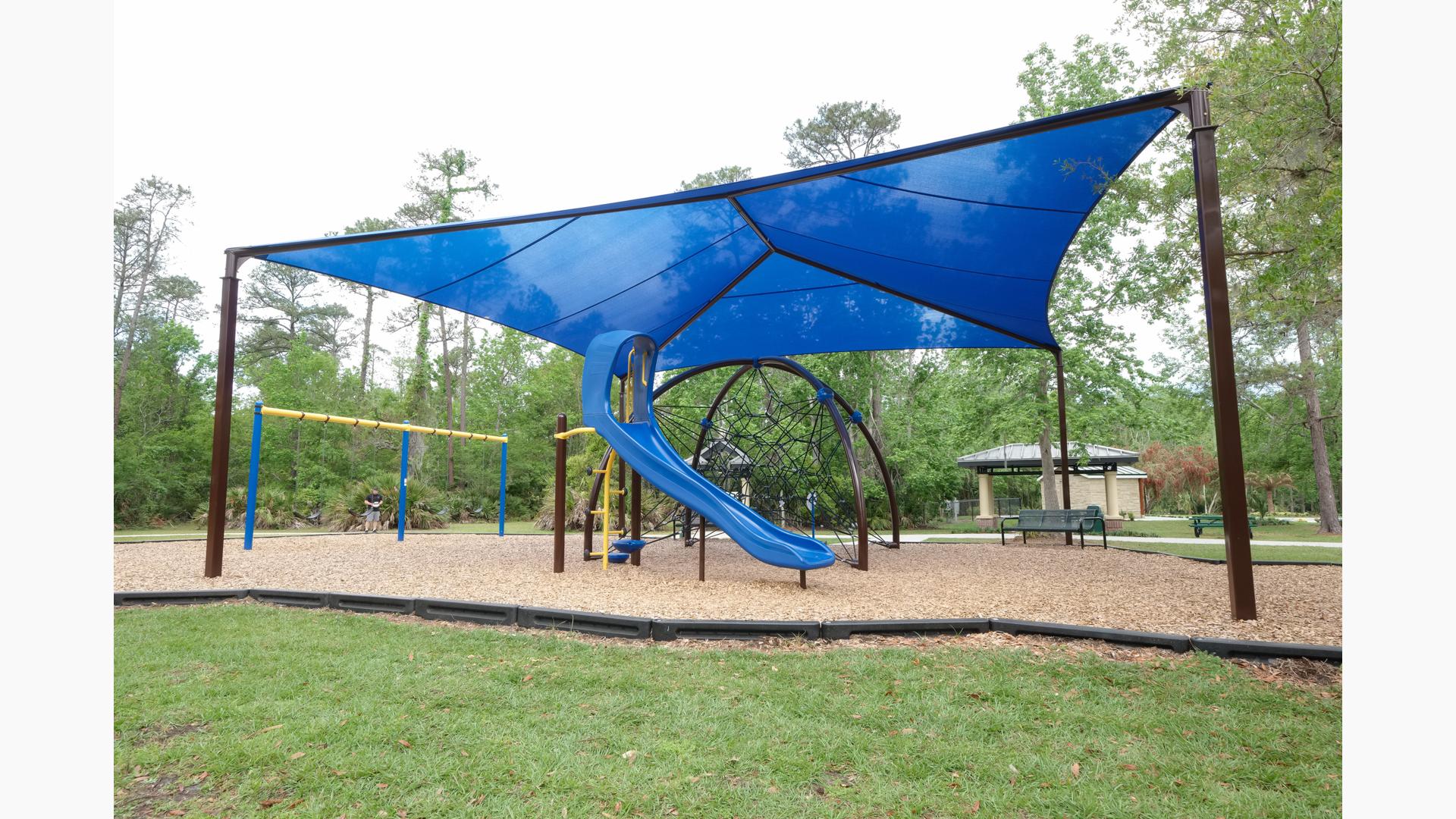 Shade covering Evos playground at Sam Smith Memorial Park.