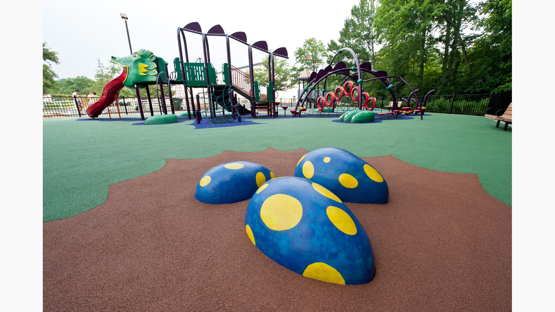 Evos and PlayBooster have combined to create this custom Midlevel Dragon-themed play structure. The dragon eggs sit adjacent under the Dragon's protection.