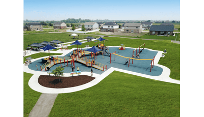 Large playground  for all ages on smooth safety surfacing with lots of activities for children of all abilities