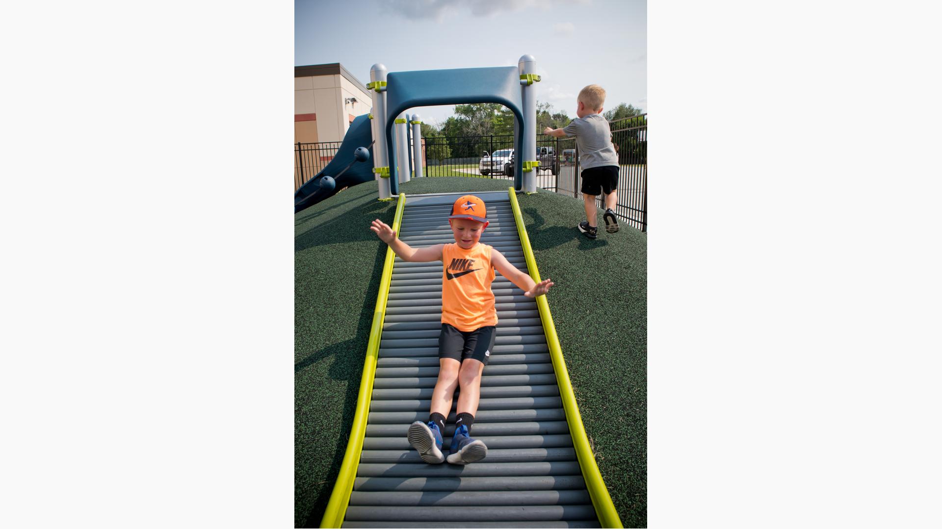 Boy riding Rollerslide