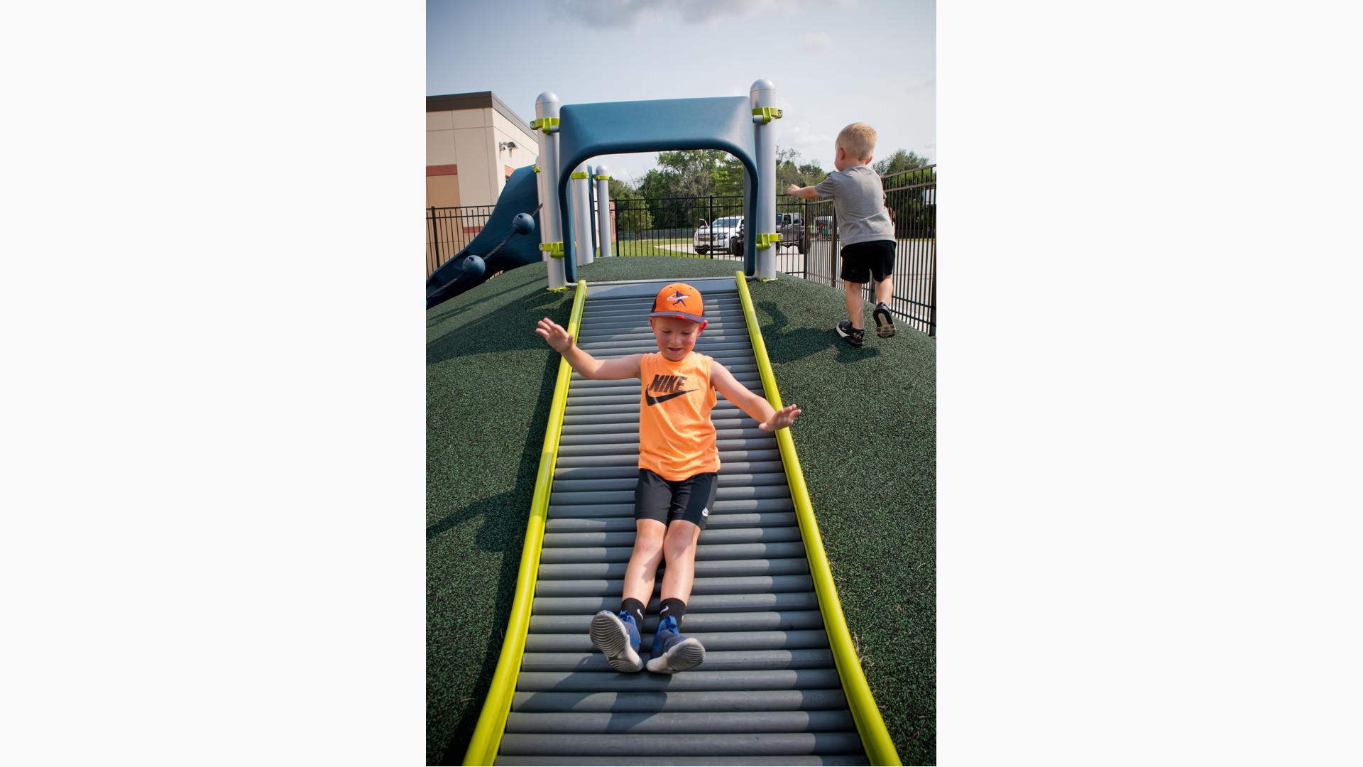 Boy riding Rollerslide