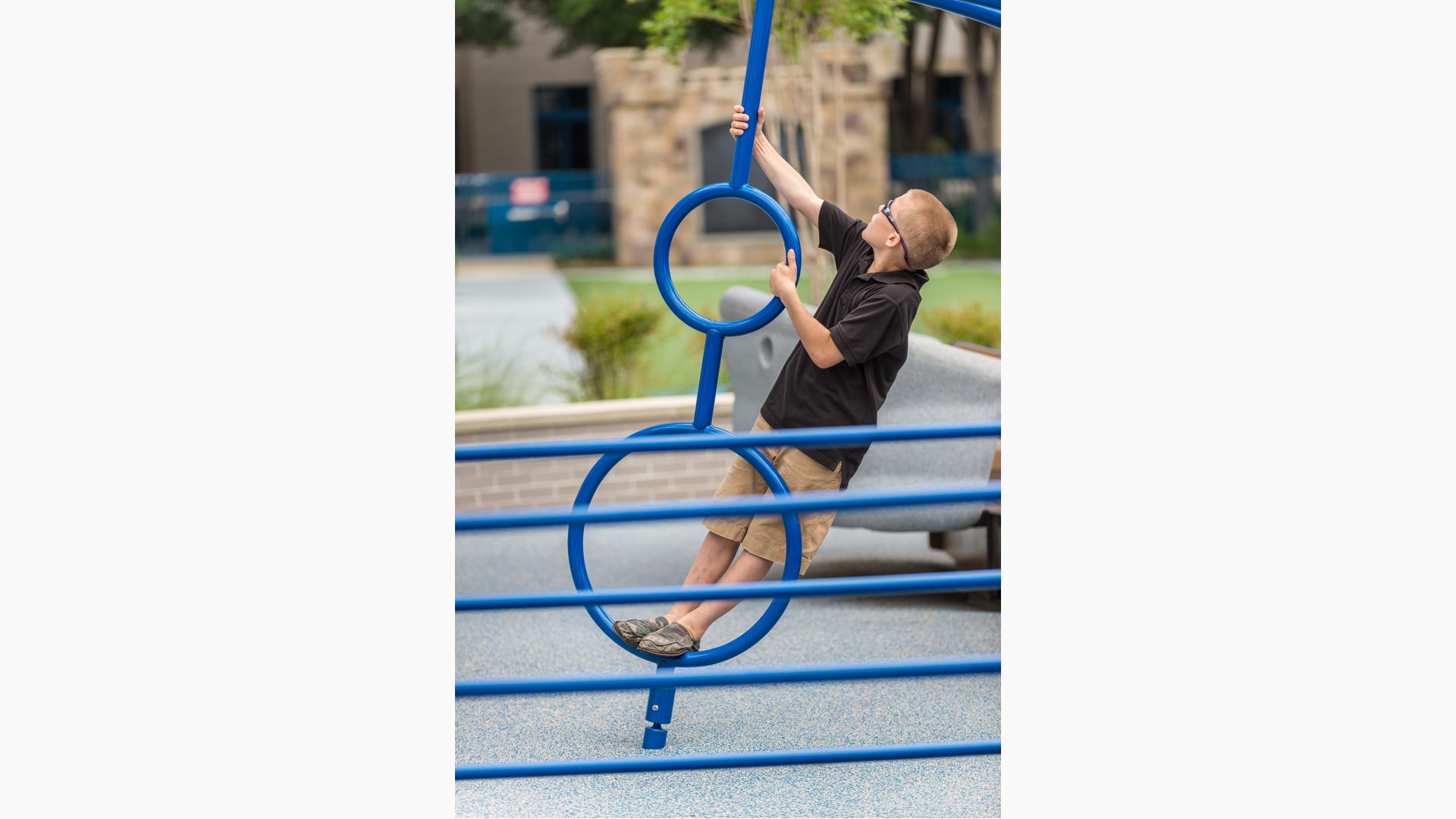 Boy playing on Gyro Twister® Spinner