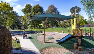 Lake Nokomis Community Center
Minneapolis, MN is a nature-inspired playground featuring a custom climber, custom log steppers and stainless steel slide. The custom SkyWays® shade structure, SlideWinder and custom roofs and tree post toppers carry the natural playground theme throughout.